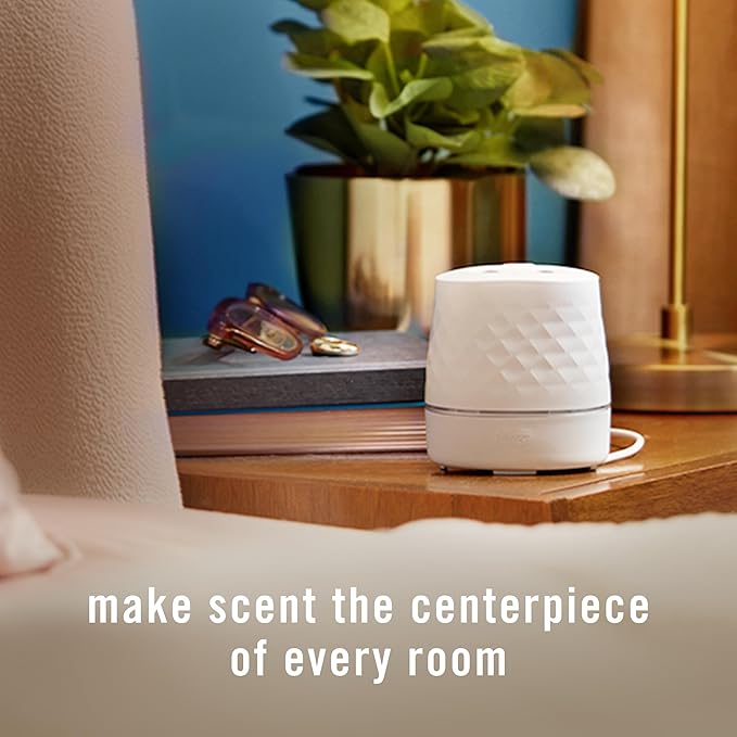 Febreze Plug Scent Booster Starter Kit, Oil Diffuser, Air Freshener Plug in, Giftable for Holidays, Continuous Scent Device + 2 Gain Original Refills